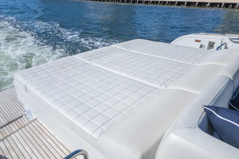 Slide: The Image of Luxurious sunbed on 2019 Pardo Yachts P50, cruising on serene waters. - 28