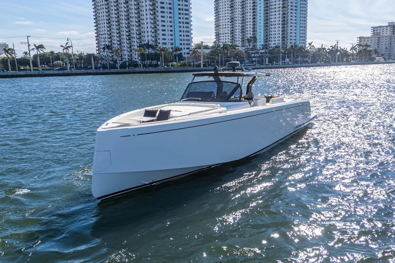 Slide: The Image of 2019 Pardo Yachts P50 cruising on sunny waters near city skyline. - 30