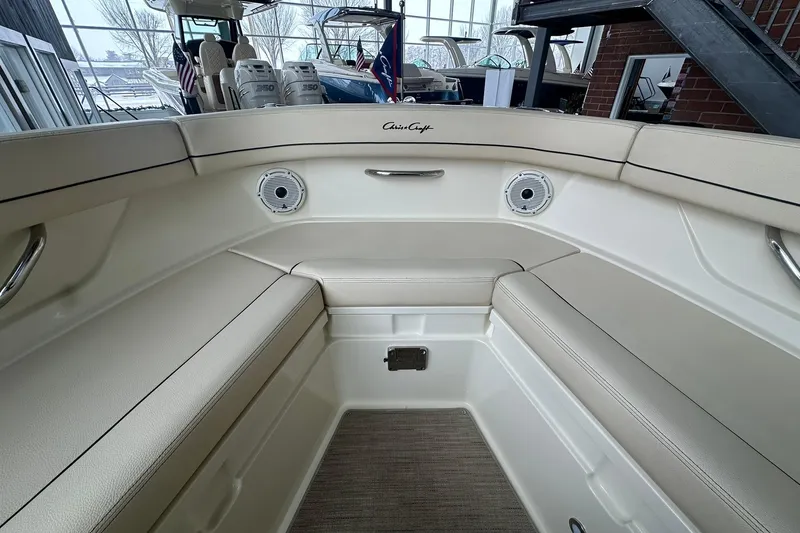 Slide: The Image of 2024 Chris-Craft Catalina 24 interior with beige seating and modern design. - 11