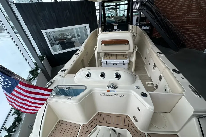 Slide: The Image of 2024 Chris-Craft Catalina 24 boat interior with American flag, showcasing luxury design. - 4