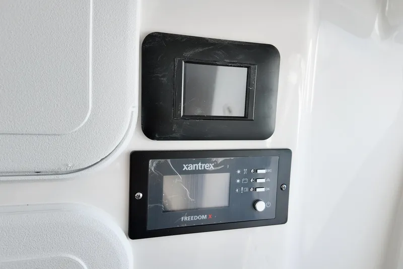 Slide: The Image of Control panel on 2026 Sea Fox 328 Commander boat featuring Xantrex Freedom X display. - 16