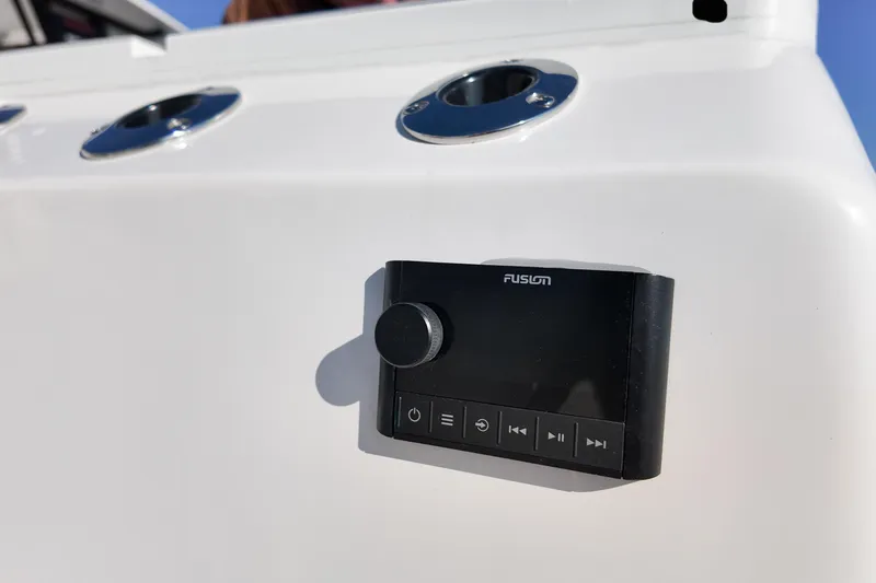 Slide: The Image of Control panel on 2026 Sea Fox 328 Commander boat, featuring Fusion audio system. - 18