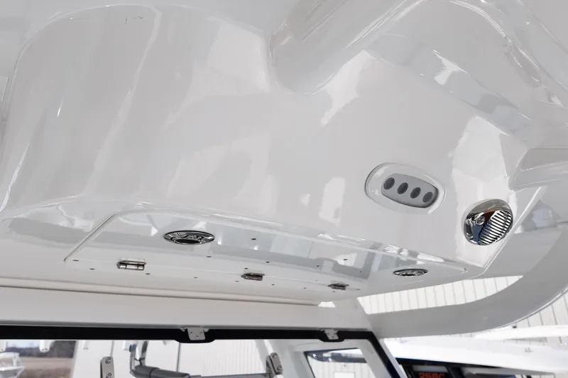 Slide: The Image of 2026 Sea Fox 328 Commander boat interior ceiling with modern fixtures. - 25