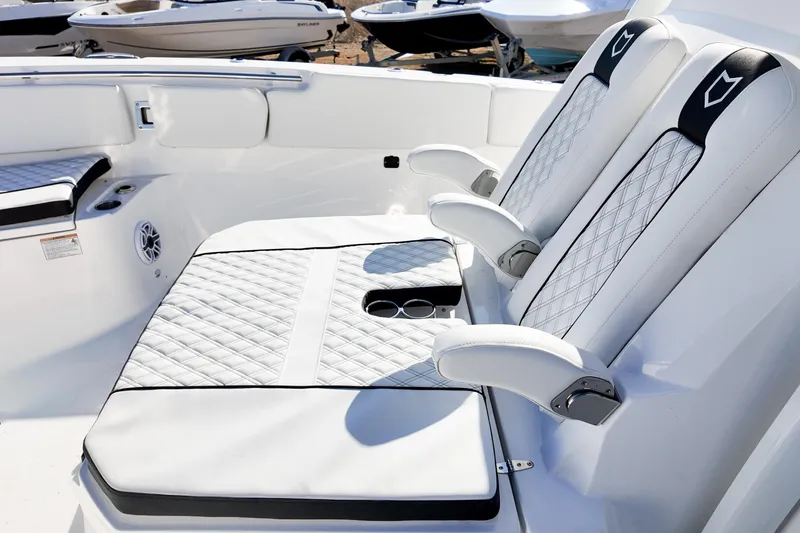 Slide: The Image of Luxurious seating on 2026 Sea Fox 328 Commander boat with quilted upholstery and armrests. - 30