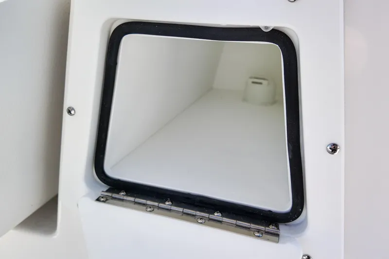 Slide: The Image of Storage compartment of 2026 Sea Fox 328 Commander boat, featuring a hinged door. - 38
