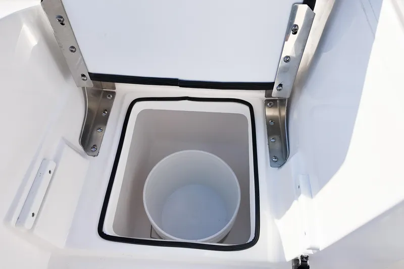Slide: The Image of Storage compartment on 2026 Sea Fox 328 Commander boat, featuring stainless steel hinges. - 5