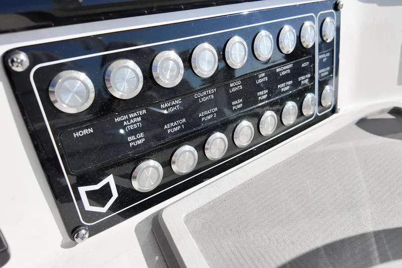Slide: The Image of Control panel of 2026 Sea Fox 328 Commander boat with labeled buttons. - 51