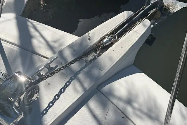 Slide: The Image of 2008 Glacier Bay 2670 Cuddy boat anchor chain and winch detail. - 8