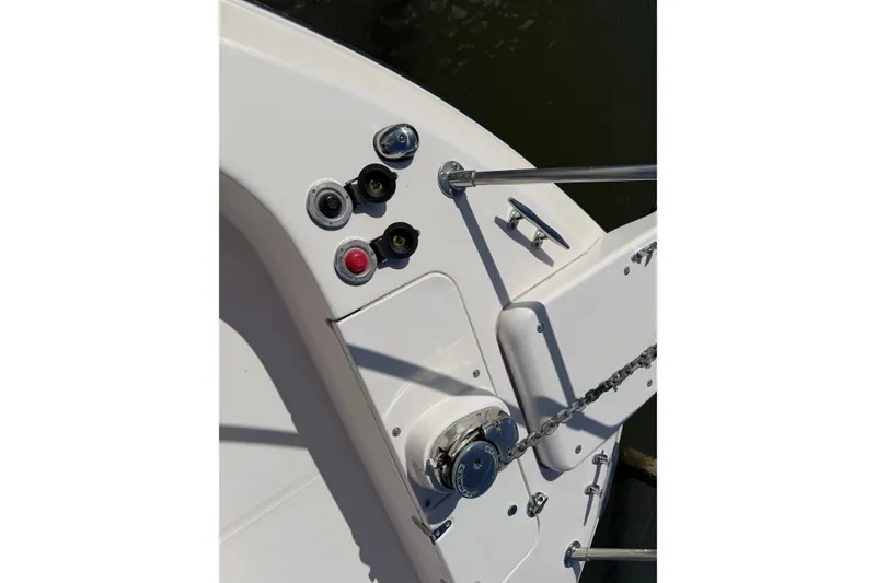 Slide: The Image of 2009 Grady-White Marlin 300 boat deck with anchor controls and fittings. - 19