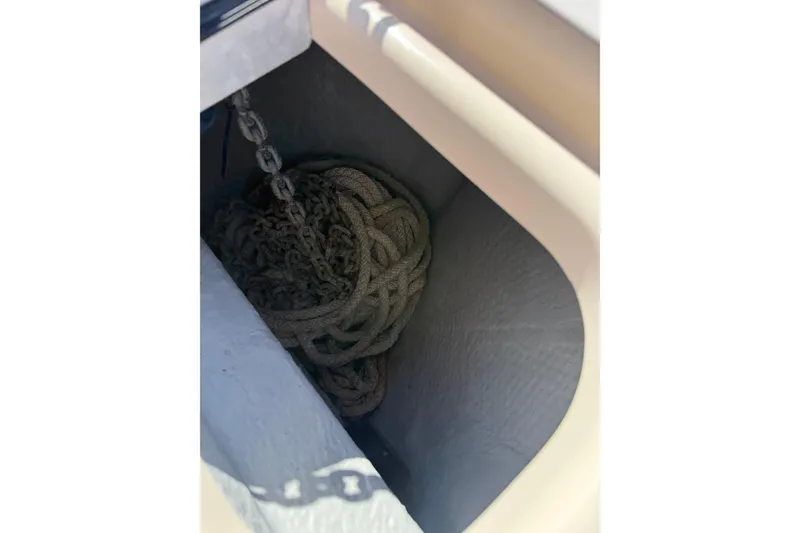 Slide: The Image of Anchor chain and rope storage on 2009 Grady-White Marlin 300 boat. - 20