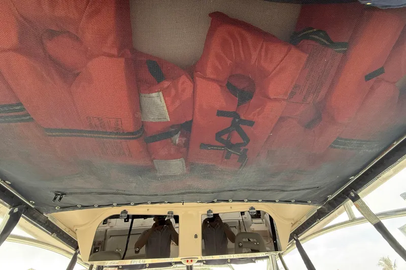 Slide: The Image of Life jackets stored on a 2009 Grady-White Marlin 300 boat. - 22