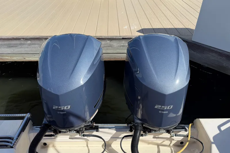 Slide: The Image of Twin Yamaha 250 outboard engines on a 2009 Grady-White Marlin 300 boat. - 34