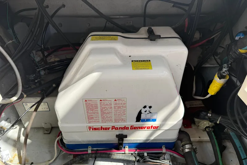 Slide: The Image of Fischer Panda generator in 2009 Grady-White Marlin 300 boat engine compartment. - 35