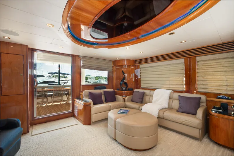 Slide: The Image of Luxurious interior of 2003 Hargrave Skylounge yacht with plush seating and elegant wood finishes. - 14
