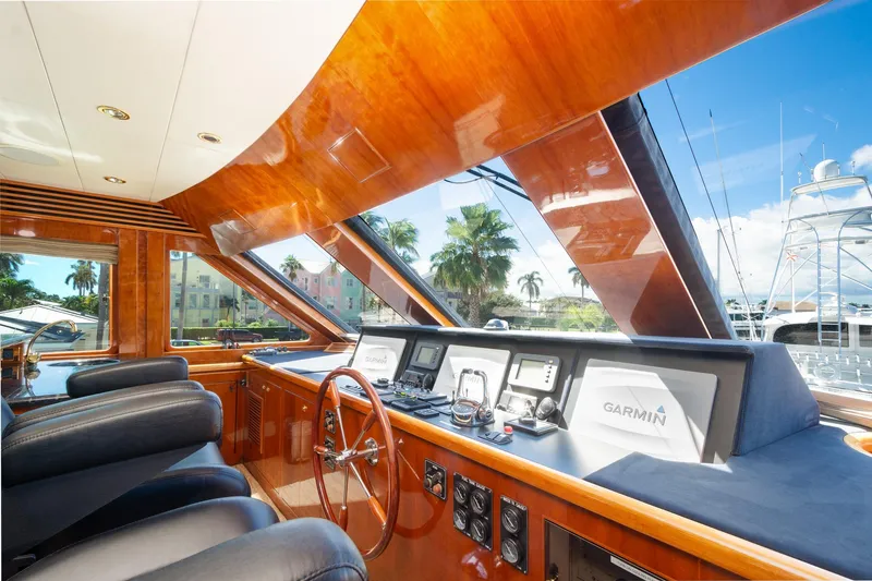 Slide: The Image of Luxurious 2003 Hargrave Skylounge yacht interior with polished wood and advanced navigation systems. - 17