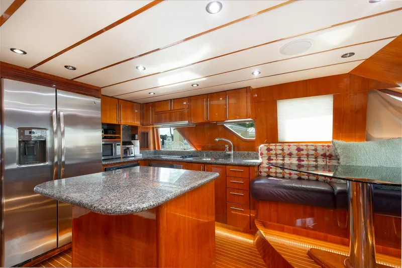 Slide: The Image of Luxurious 2003 Hargrave Skylounge yacht kitchen with granite countertops and stainless steel appliances. - 21