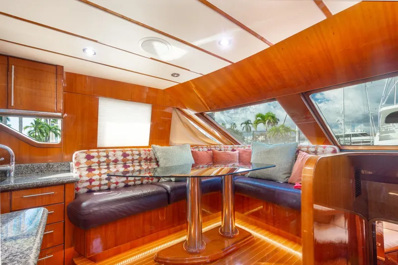 Slide: The Image of Luxurious 2003 Hargrave Skylounge yacht interior with plush seating and elegant wood finishes. - 22