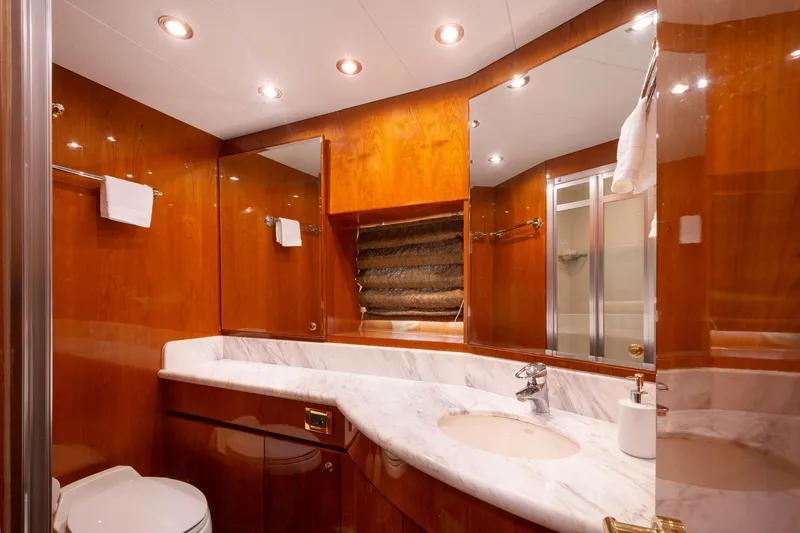 Slide: The Image of Luxurious bathroom in 2003 Hargrave Skylounge yacht with marble countertop and wooden cabinetry. - 28