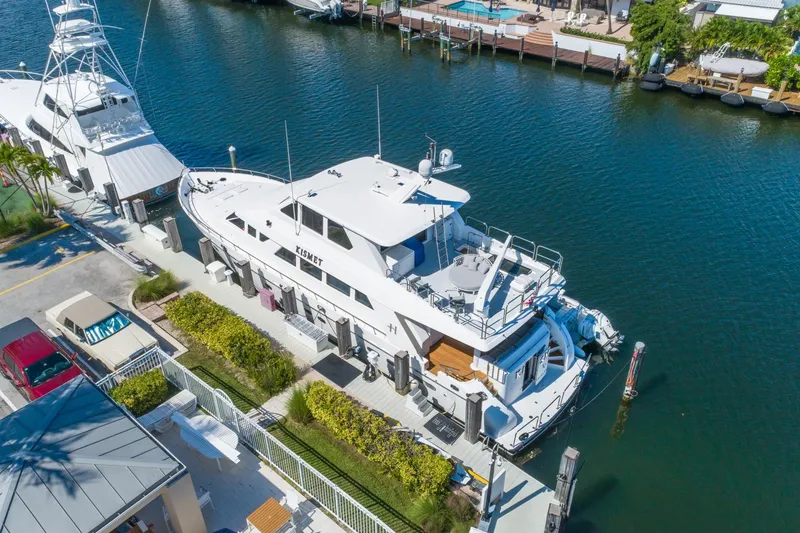 Slide: The Image of Aerial view of 2003 Hargrave Skylounge yacht docked in a marina. - 3