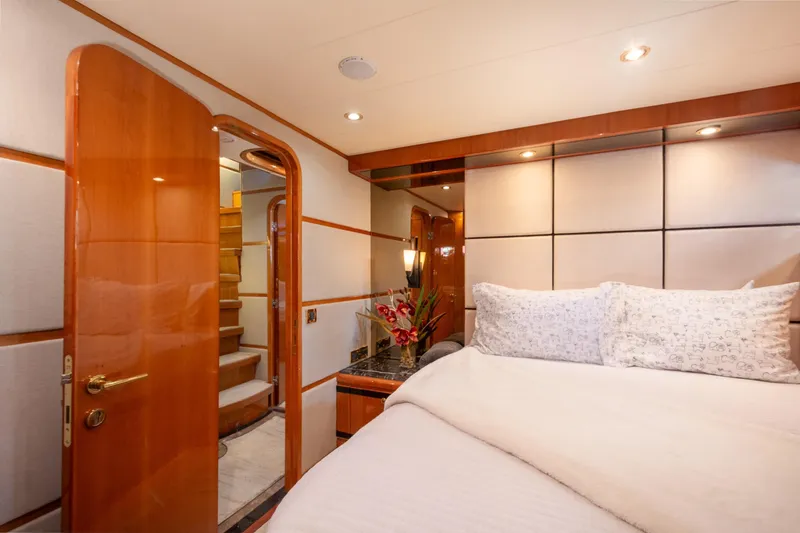 Slide: The Image of Luxurious bedroom interior of 2003 Hargrave Skylounge yacht with elegant wood finishes. - 37