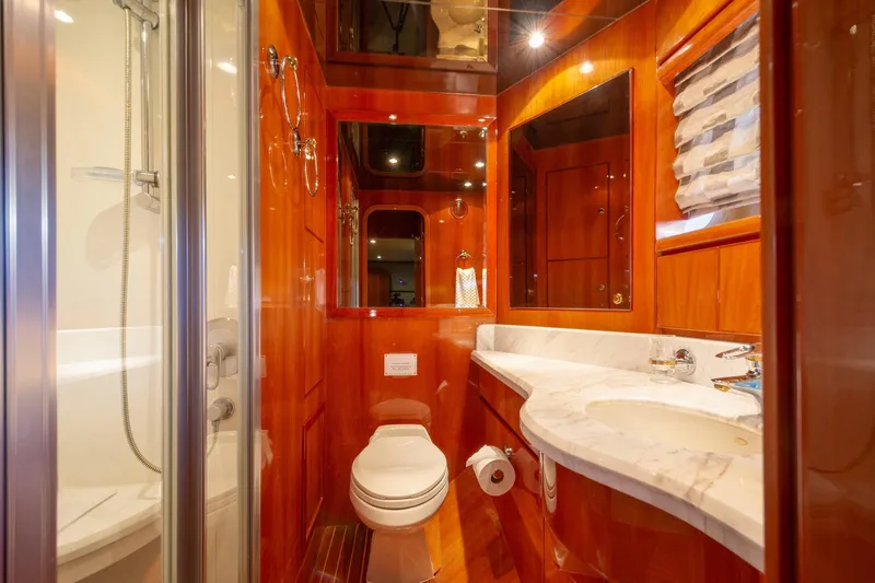 Slide: The Image of Luxurious bathroom in 2003 Hargrave Skylounge yacht with wood accents and marble countertop. - 40