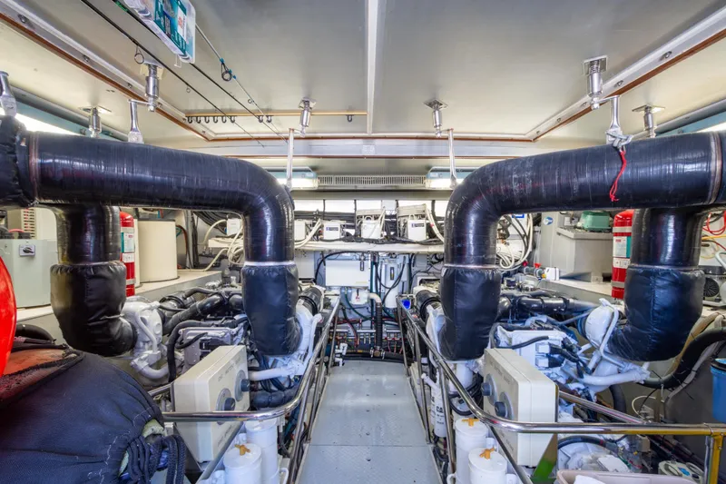 Slide: The Image of Engine room of 2003 Hargrave Skylounge yacht with complex machinery and piping. - 41