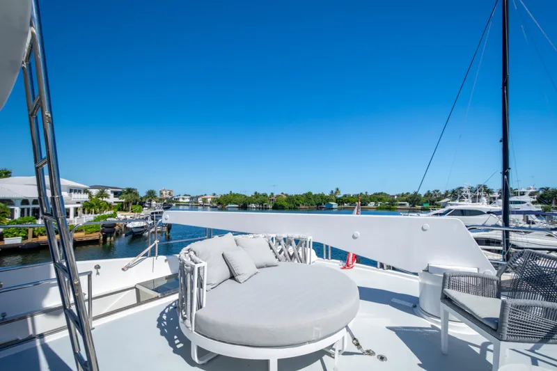 Slide: The Image of Luxurious 2003 Hargrave Skylounge yacht deck with round sunbed and waterfront view. - 7