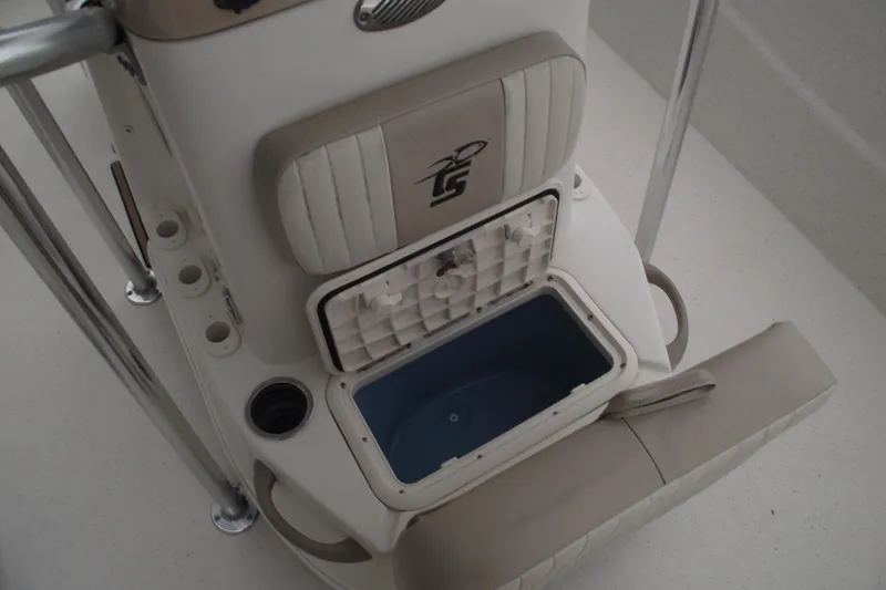 Slide: The Image of 2016 Carolina Skiff 198 DLV boat interior with open storage compartment. - 11