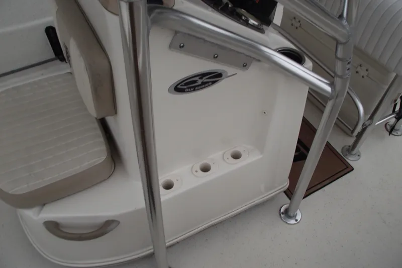 Slide: The Image of 2016 Carolina Skiff 198 DLV boat interior with seating and console details. - 12