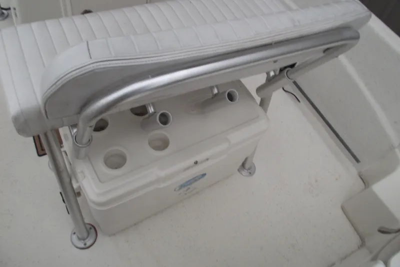 Slide: The Image of 2016 Carolina Skiff 198 DLV boat seat with integrated storage and rod holders. - 25