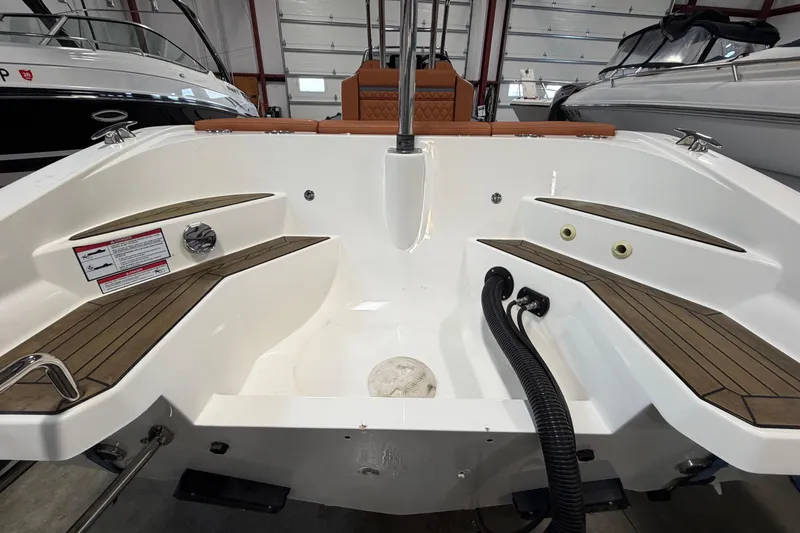 Slide: The Image of 2023 Cobra Ribs Nautique 8.2m boat interior with teak decking and modern design. - 15