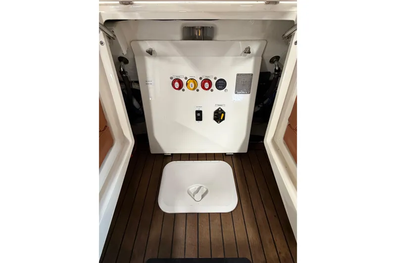 Slide: The Image of Control panel of 2023 Cobra Ribs Nautique 8.2m boat with wooden flooring. - 14