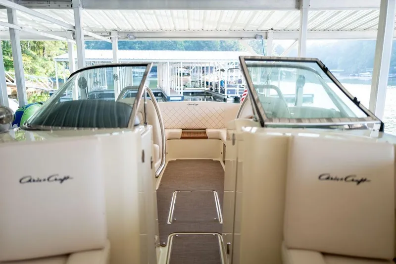 Slide: The Image of 2023 Chris-Craft Launch 27 boat interior with elegant seating and windshield. - 5