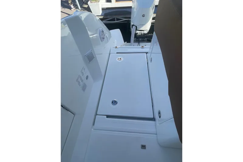 Slide: The Image of 2026 Jeanneau TH38 boat deck with sleek white finish and modern design. - 24