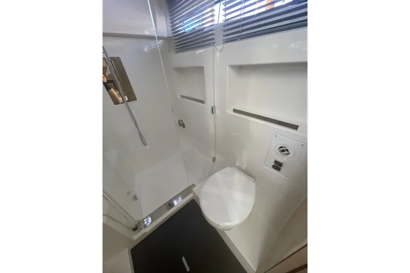 Slide: The Image of Modern bathroom interior of 2026 Jeanneau TH38 yacht with sleek design and fixtures. - 31