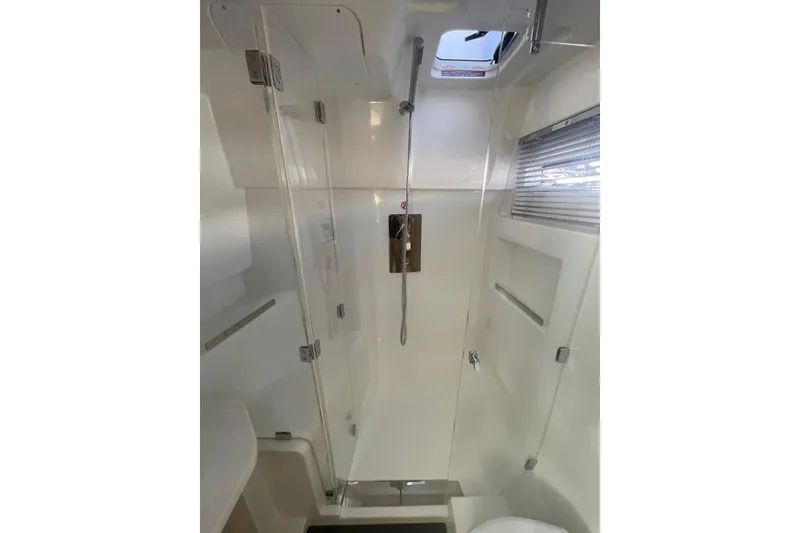 Slide: The Image of Modern bathroom interior of 2026 Jeanneau TH38 yacht with sleek shower design. - 32