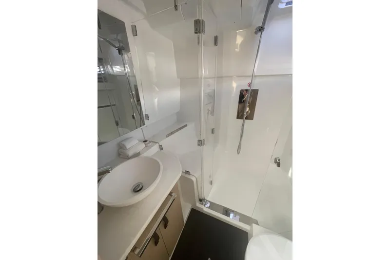 Slide: The Image of Modern bathroom in 2026 Jeanneau TH38 yacht with sleek shower and basin. - 33