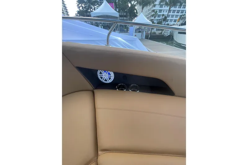 Slide: The Image of Luxurious interior of 2026 Jeanneau TH38 yacht with speaker and cup holders. - 50