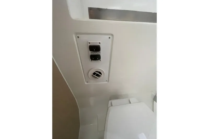 Slide: The Image of Control panel and vent in Jeanneau TH38, 2026 model boat interior. - 56