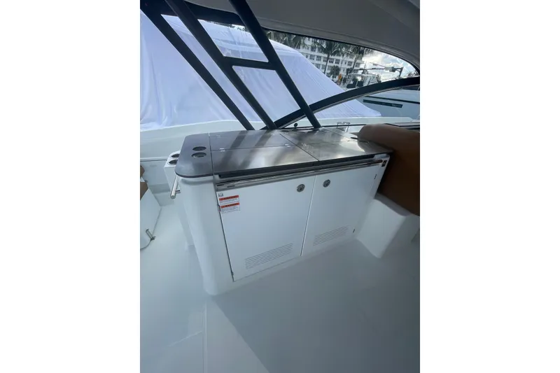 Slide: The Image of 2026 Jeanneau TH38 yacht interior with sleek cabinetry and modern design. - 84