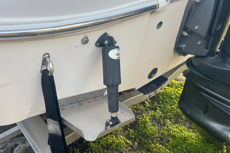 Slide: The Image of 2011 Wellcraft 232 Coastal boat transom with motor mount and trim tab. - 31