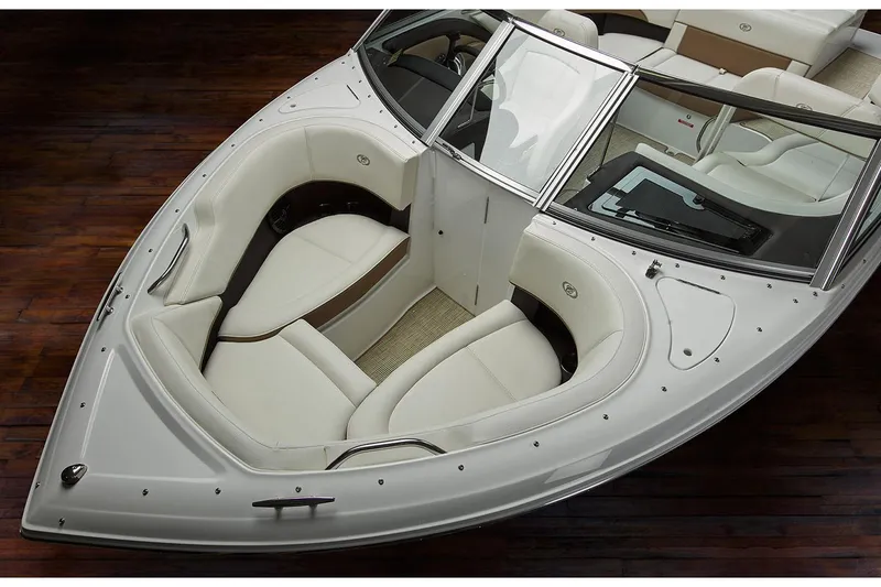 Slide: The Image of Manufacturer Provided Image: 2020 Cobalt 200S boat interior with white seating and wood accents. - 4
