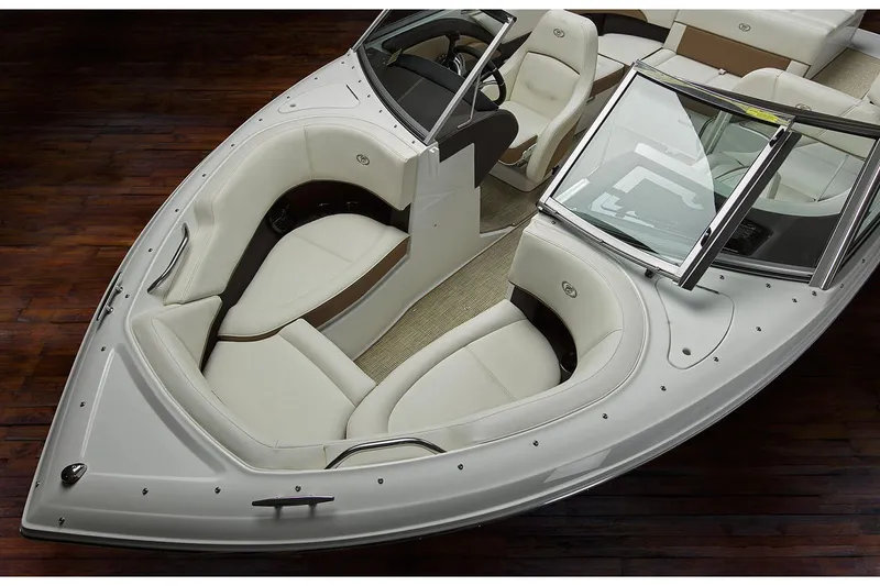 Slide: The Image of Manufacturer Provided Image: 2020 Cobalt 200S boat interior with white seating and wooden flooring. - 5