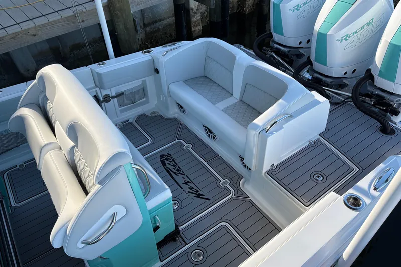 Slide: The Image of 2024 Nor-Tech 390 Sport Center Console with luxurious seating and powerful engines. - 20