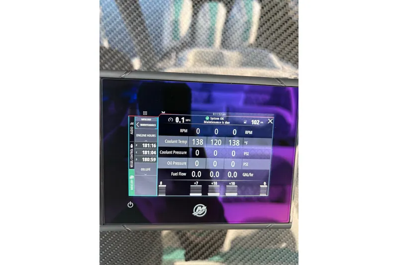 Slide: The Image of 2024 Nor-Tech 390 Sport Center Console dashboard display showing engine metrics and maintenance status. - 25