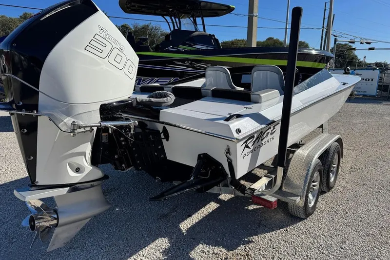 Slide: The Image of 1988 Activator 22 boat with powerful Racing 300 engine on a trailer. - 6