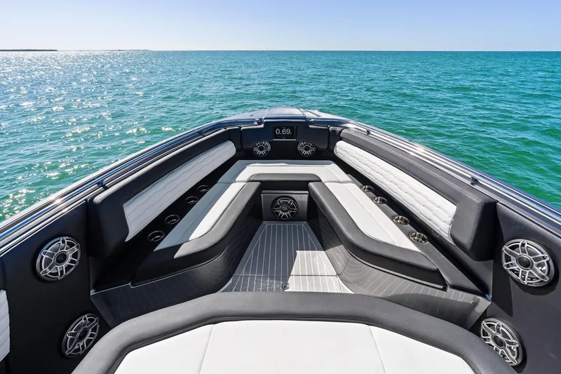Slide: The Image of Luxurious 2020 Cigarette 42' Auroris boat interior with sleek seating on open water. - 13