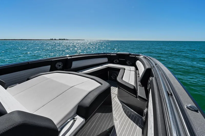 Slide: The Image of Luxurious 2020 Cigarette 42' Auroris boat interior on open water under clear blue sky. - 18