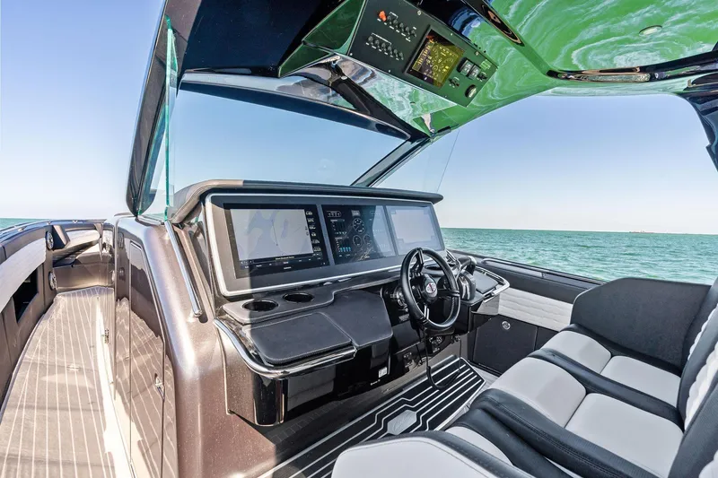 Slide: The Image of Luxury 2020 Cigarette 42' Auroris boat interior with advanced navigation system. - 20