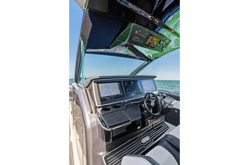 Slide: The Image of Cockpit of 2020 Cigarette 42' Auroris boat with advanced navigation displays. - 21